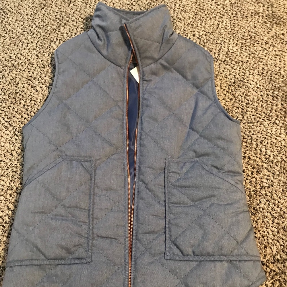 NWT denim blue vest with rose gold details. Small